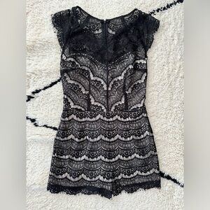 Black lace and cream shorts romper excellent used condition size S
